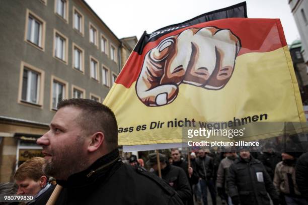 March 2018, Germany, Cottbus: Participants in an anti-refugee demonstration by the group "Zukunft Heimat". Photo: Carsten Koall/dpa