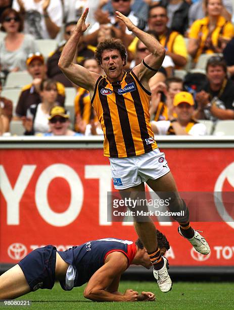 Campbell Brown of the Hawks celebrates a goal during the round one AFL match between the Melbourne Demons and the Hawthorn Hawks at Melbourne Cricket...