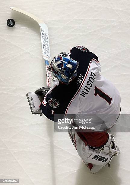 Steve Mason of the Columbus Blue Jackets warms up before playing against the New Jersey Devils at the Prudential Center on March 23, 2010 in Newark,...