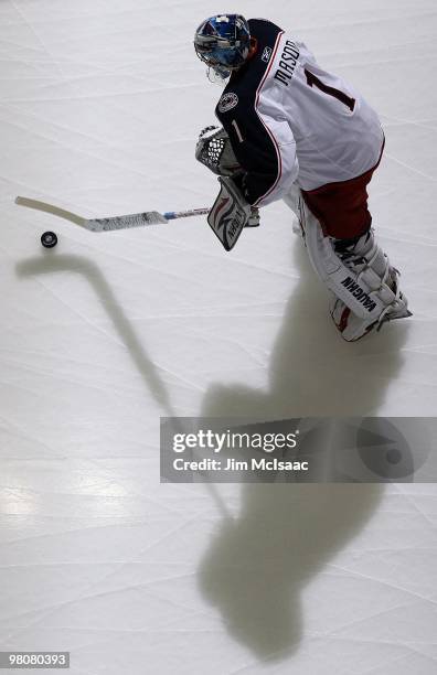 Steve Mason of the Columbus Blue Jackets warms up before playing against the New Jersey Devils at the Prudential Center on March 23, 2010 in Newark,...