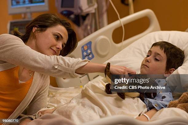 From left, Keri Russell as Aileen Crowley and Diego Velazquez as Patrick Crowley in CBS Films' Extraordinary Measures.