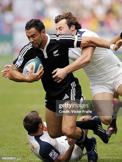 Zar Lawrence of New Zealand is tackled during the match against France on day two of the IRB Hong Kong Sevens on March 27, 2010 in Hong Kong.