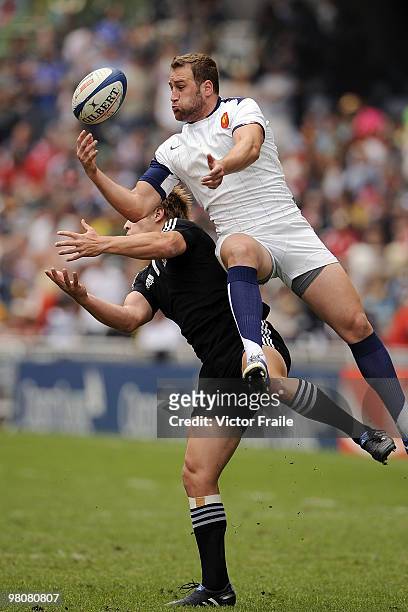 Remi Vaquin of France and Ben Souness of New Zealand compete for the ball on day two of the IRB Hong Kong Sevens on March 27, 2010 in Hong Kong.