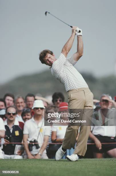 Tom Watson of the United States follows his ball off the tee during the 112th Open Championship on 13 July 1983 at Royal Birkdale Golf Club in...