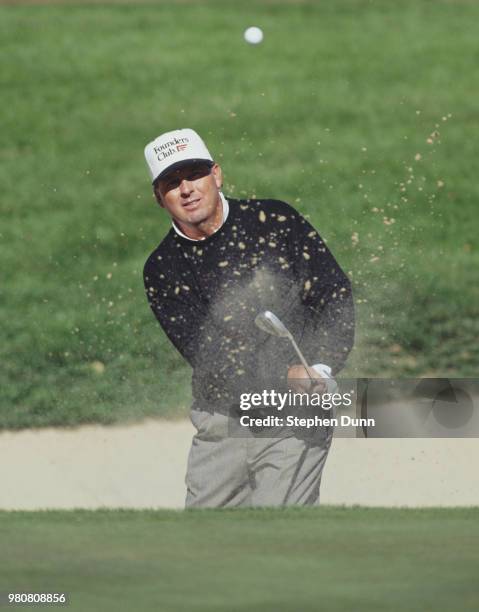 Mark O'Meara of the United States hits out of the sand bunker during the Franklin Funds Shark Shootout golf tournament on 18 November 1994 at the...