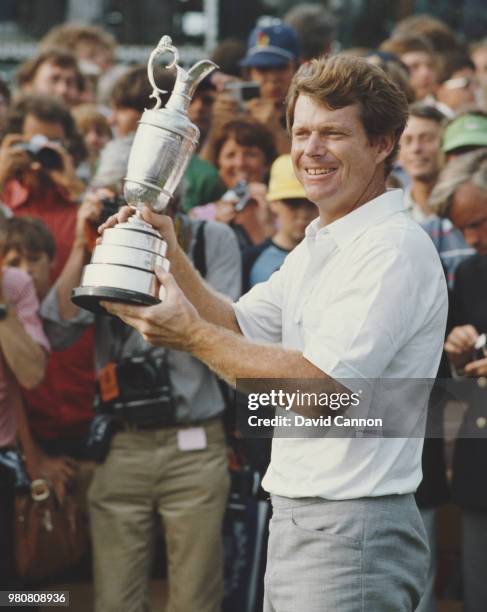 Tom Watson of the United States holds the slightly damaged Claret Jug trophy after winning the 112th Open Championship on 14 July 1983 at Royal...