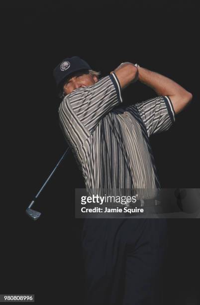 Greg Norman of Australia follows his shot during the PGA Doral-Ryder Open golf tournament on 8 March 1997 at the Doral Golf Resort & Spa in Doral,...