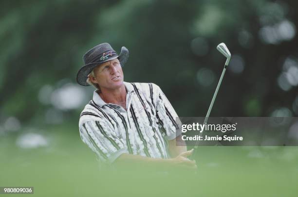 Greg Norman of Australia follows his shot during practice for the 97th United States Open Championship golf tournament on 11 June 1997 at the Blue...