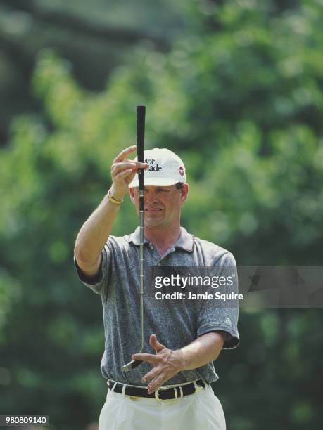 Lee Janzen of the United States lining up his putt during the 79th PGA Championship golf tournament on 17 August 1997 at the Winged Foot Golf Club in...