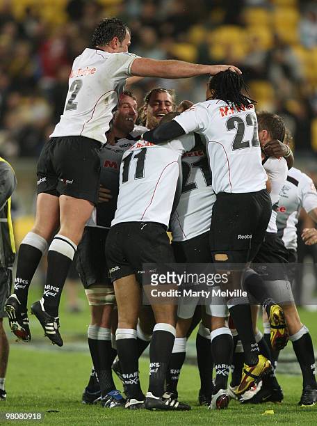 The Sharks celebrate victory after the round seven Super 14 match between the Hurricanes and the Sharks at Westpac Stadium on March 27, 2010 in...