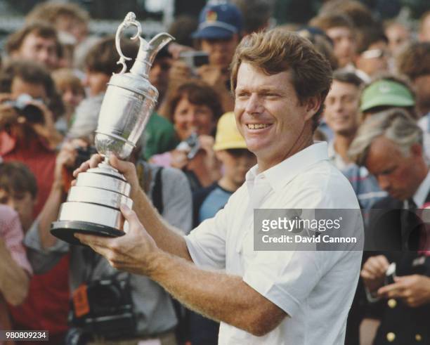 Tom Watson of the United States holds the slightly damaged Claret Jug trophy after winning the 112th Open Championship on 14 July 1983 at Royal...