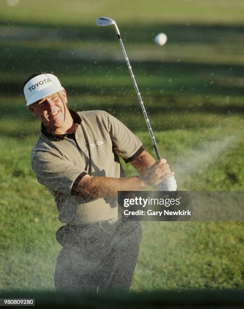 Mark O'Meara of the United States hits out of the sand bunker during the Franklin Funds Shark Shootout golf tournament on 21 November 1993 at the...