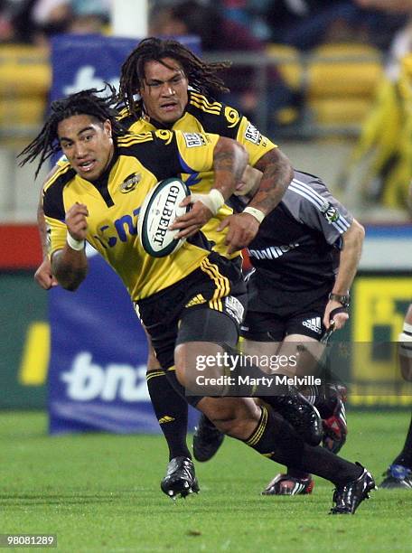 Ma'a Nonu of the Hurricanes runs with the ball during the round seven Super 14 match between the Hurricanes and the Sharks at Westpac Stadium on...