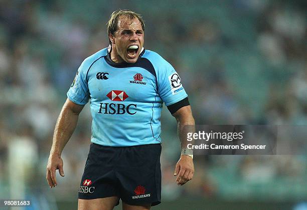 Waratahs captain Phil Waugh yells out to team mates during the round seven Super 14 match between the Waratahs and the Blues at Sydney Football...