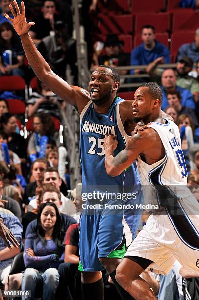 Al Jefferson of the Minnesota Timberwolves calls for the ball in the post against Rashard Lewis of the Orlando Magic during the game on March 26,...