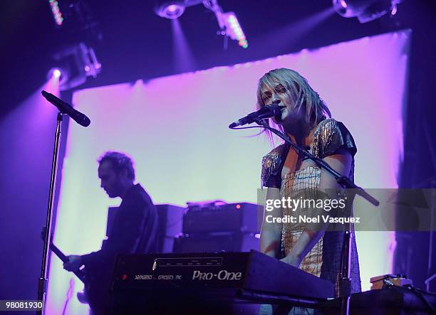 Emily Haines and James Shaw of Metric perform at The Hollywood Palladium on March 26, 2010 in Hollywood, California.