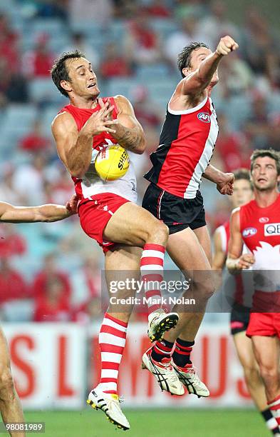 Daniel Bradshaw of the Sawns contests possession during the round one AFL match between the Sydney Swans and the St Kilda Saints at ANZ Stadium on...