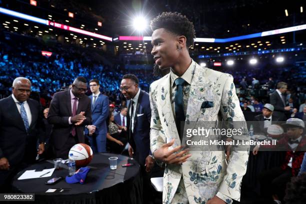 Shai Gilgeous-Alexander looks on after being selected eleventh by the Charlotte Hornets on June 21, 2018 at Barclays Center during the 2018 NBA Draft...