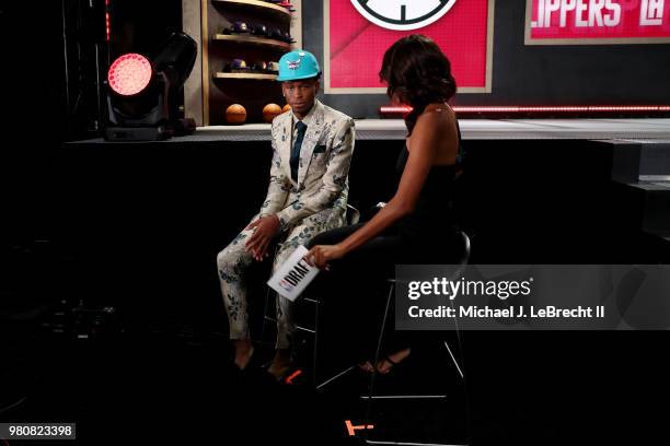 Shai Gilgeous-Alexander talks to the media after being selected eleventh by the Charlotte Hornets on June 21, 2018 at Barclays Center during the 2018...