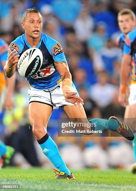 Scott Prince of the Titans passes the ball during the round three NRL match between the Gold Coast Titans and the Canberra Raiders at Skilled Park on...