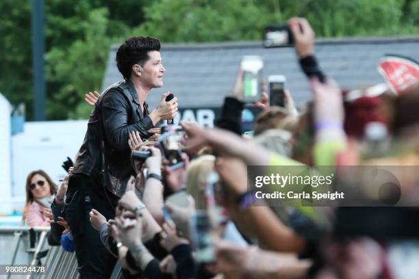 The Script's Danny O'Donoghue performs with fans in the crowd at Scarborough Open Air Theatre on June 21, 2018 in Scarborough, England.