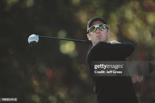 David Duval of the United States keeps his eye on his shot during the Williams World Challenge golf tournament on15 December 2001 at the Sherwood...