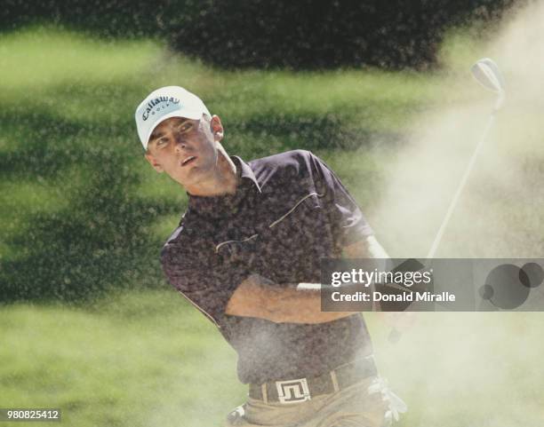 Charles Howell III of the United States hits out of the sand from a bunker during the Sony Open in Hawaii golf tournament on 13 January 2002 at the...
