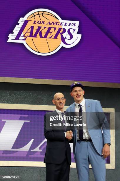 Moritz Wagner poses with NBA Commissioner Adam Silver after being drafted 25th overall by the Los Angeles Lakers during the 2018 NBA Draft at the...