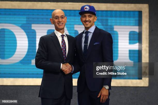 Landry Shamet poses with NBA Commissioner Adam Silver after being drafted 26th overall by the Philadelphia 76ers during the 2018 NBA Draft at the...