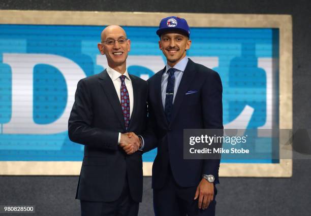 Landry Shamet poses with NBA Commissioner Adam Silver after being drafted 26th overall by the Philadelphia 76ers during the 2018 NBA Draft at the...