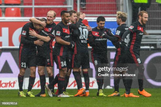 March 2018, Germany, Ingolstadt: Football 2nd Bundesliga, FC Ingolstadt 04 vs Dynamo Dresden at the Audi Sportpark. The Ingolstadt team celebrates...