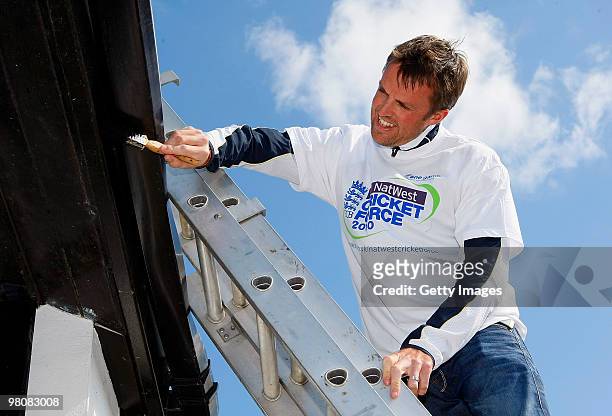 Graeme Swann helps with painting during the NatWest CricketForce at Gedling Colliery Cricket Club on March 27, 2010 in Nottingham, England. 85,000...