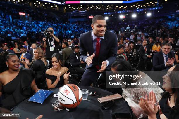 Miles Bridges reacts after being selected twelfth by the LA Clippers on June 21, 2018 at Barclays Center during the 2018 NBA Draft in Brooklyn, New...