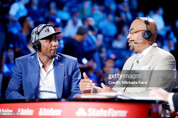 Donovan Mitchell and Dennis Scott talk during the 2018 NBA Draft on June 21, 2018 at Barclays Center in Brooklyn, New York. NOTE TO USER: User...