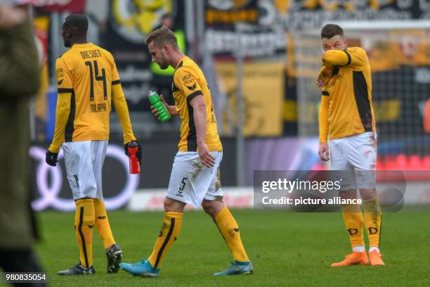 March 2018, Germany, Ingolstadt: Football 2nd Bundesliga, FC Ingolstadt 04 vs Dynamo Dresden at the Audi Sportpark. The Dresden team are disappointed...