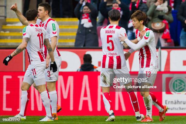 March 2018, Germany, Cologne: Football, Bundesliga, 1. FC Cologne vs Bayer Leverkusen at the RheinEnergieStadion. Cologne's Yuya Osako celebrates...