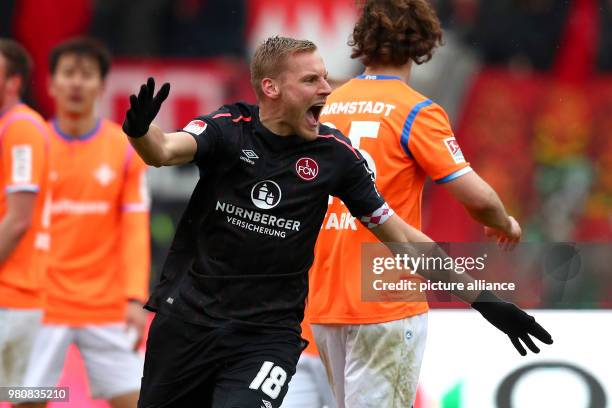 March 2018, Germany, Nuremberg: Football 2nd Bundesliga, 1. FC Nuremberg vs Darmstadt 98 at the Max-Morlock-Stadion. Nuremberg's Hanno Behrens...