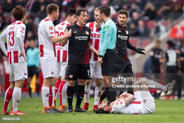 March 2018, Germany, Cologne: Football, Bundesliga, 1. FC Cologne vs Bayer Leverkusen at the RheinEnergieStadion. Cologne's Dominic Maroh on the...