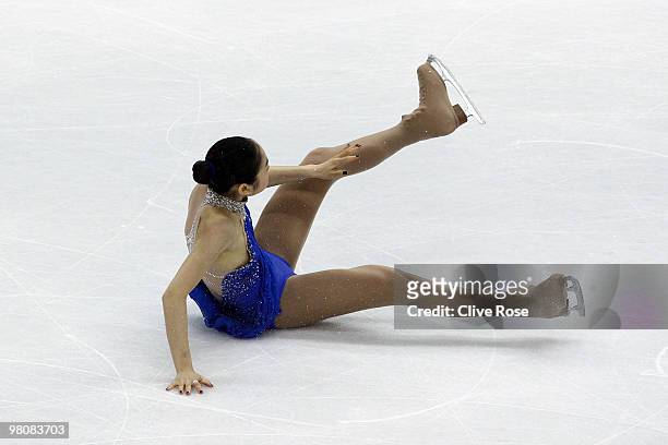 Yu-Na Kim of Korea falls during the Ladies Free Skate at the 2010 ISU World Figure Skating Championships on March 27, 2010 at the Palevela in Turin,...
