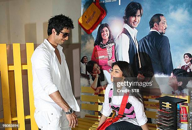 Indian Bollywood personalities Shahid Kapoor and Ayesha Takia pose while on location for the Hindi film "Paathshala" in Mumbai on March 27, 2010. AFP...