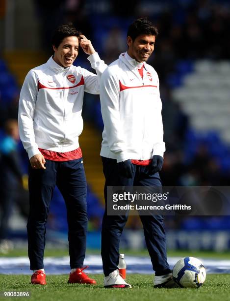 Eduardo of Arsenal stands with Samir Nasri during warm up during the Barclays Premier League match between Birmingham City and Arsenal at St. Andrews...