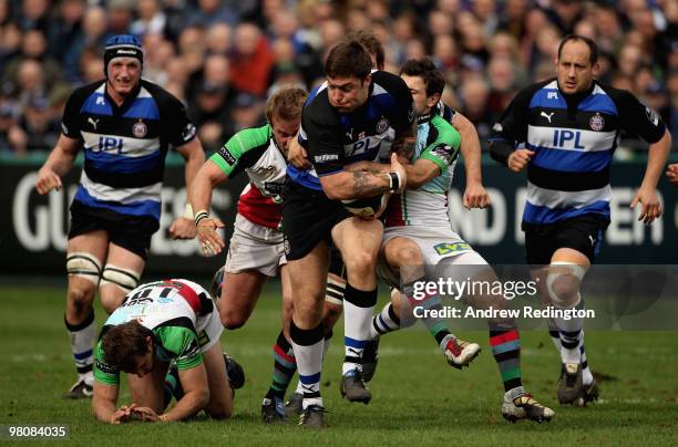 Matt Banahan of Bath takes on the Harlequins defence during the Guinness Premiership match between Bath and Harlequins at the Recreation Ground on...