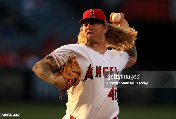 John Lamb of the Los Angeles Angels of Anaheim pitches during the first inning of a game against the Toronto Blue Jays at Angel Stadium on June 21,...