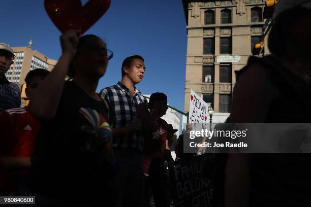 Protesters walk though the streets as they protest against the Trump administration's immigration policies on June 21, 2018 in El Paso, Texas. Before...