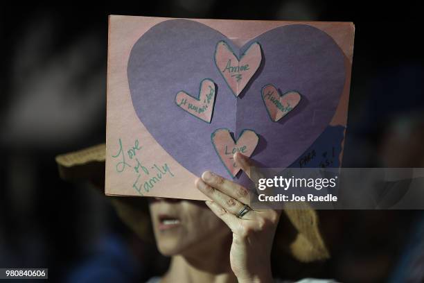 Protesters walk though the streets as they protest against the Trump administration's immigration policies on June 21, 2018 in El Paso, Texas. Before...