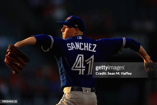 Aaron Sanchez of the Toronto Blue Jays pitches during the first inning of a game against the Los Angeles Angels of Anaheim at Angel Stadium on June...