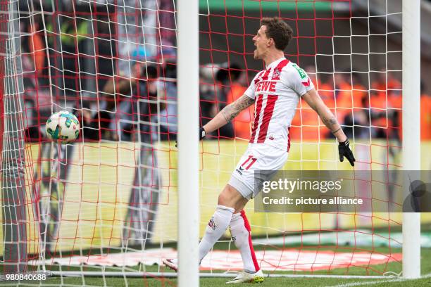 March 2018, Germany, Cologne: Football, Bundesliga, 1. FC Cologne vs Bayer Leverkusen at the RheinEnergieStadion. Cologne goalscorer Simon Zoller...