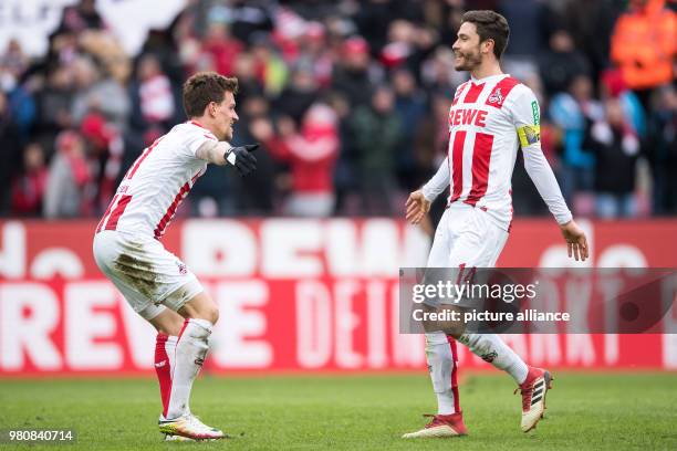 March 2018, Germany, Cologne: Football, Bundesliga, 1. FC Cologne vs Bayer Leverkusen at the RheinEnergieStadion. Cologne goalie Simon Zoller and...