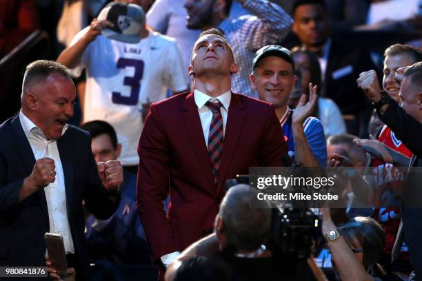 Dzanan Musa reacts in the crowd after being drafted 29th overall by the Brooklyn Nets during the 2018 NBA Draft at the Barclays Center on June 21,...