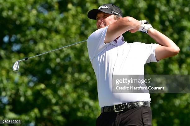 Matt Jones watches his tee shot on the second hole during the first round of the Travelers Championship on Thursday, June 21, 2018 at TPC River...